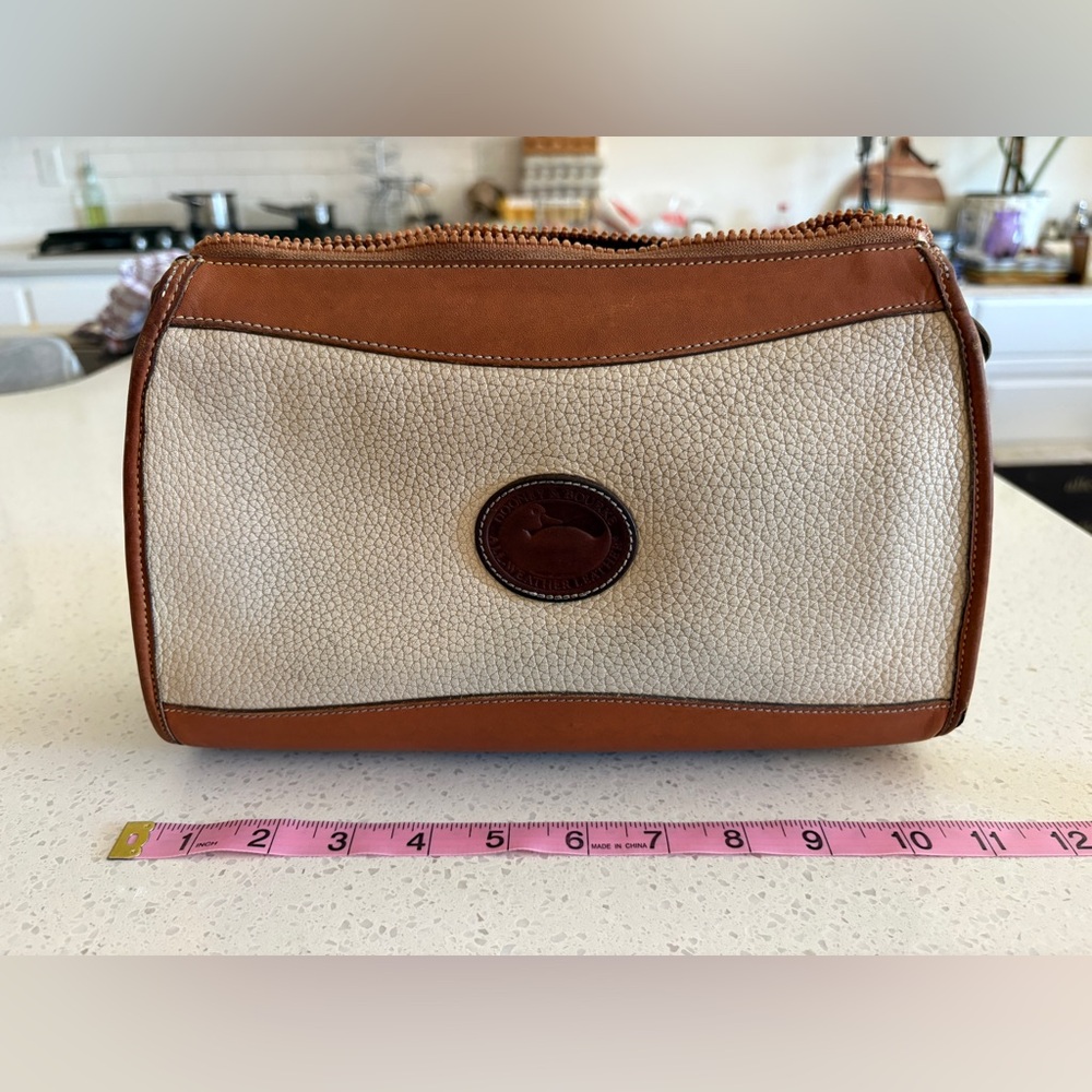 Dooney & Bourke Cream Pebbled Leather Cosmetic Pouch with Brown Trim